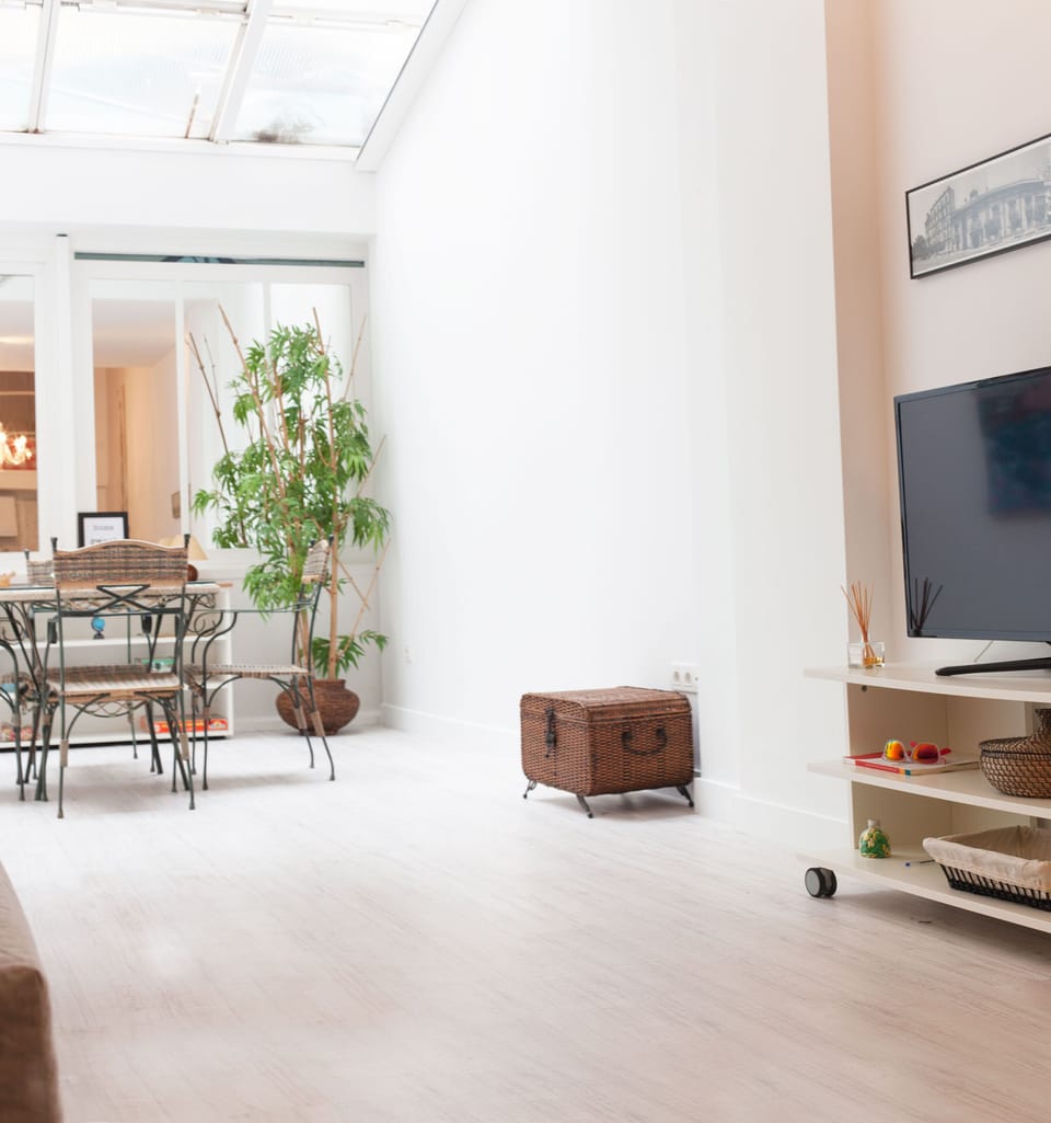 City Apartment, Non Smoking, Kitchen | Living area | 50-inch Smart TV with cable channels