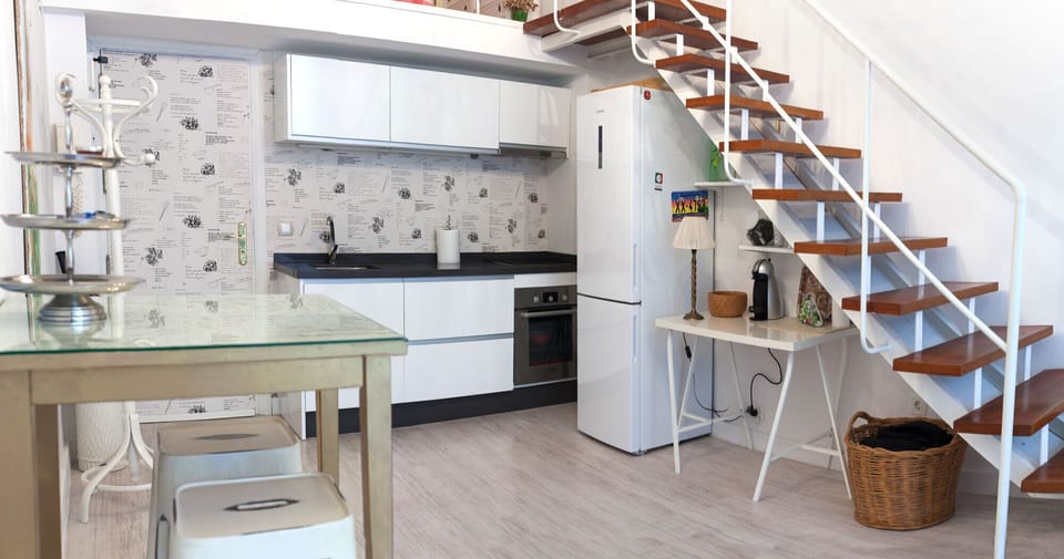 City Apartment, Non Smoking, Kitchen | Living area | 50-inch Smart TV with cable channels