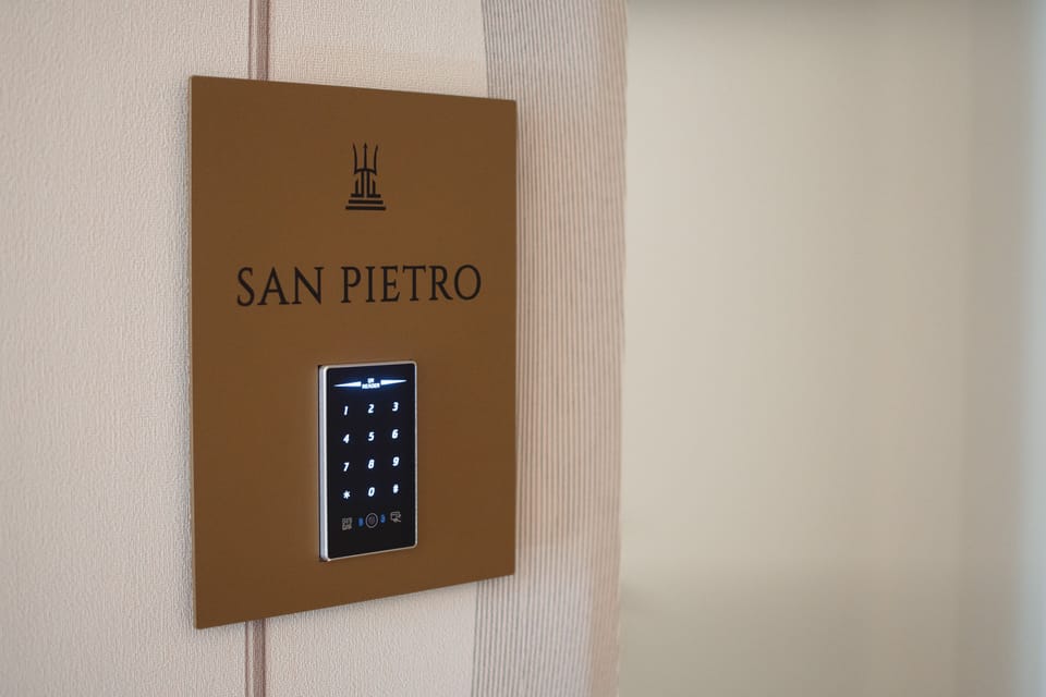 San Pietro - Luxury Room | Minibar, in-room safe, desk, laptop workspace