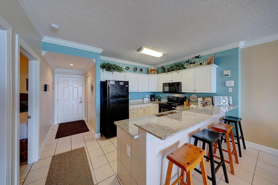 Condo, Multiple Beds (Ocean Villa 1104) | Private kitchen | Oven, stovetop, dishwasher, toaster