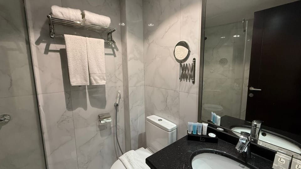 Deluxe Double Room | Bathroom | Separate tub and shower, rainfall showerhead, hair dryer, towels
