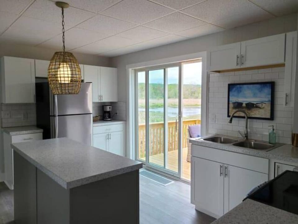 Family Suite, 2 Bedrooms | Private kitchen | Microwave, coffee/tea maker