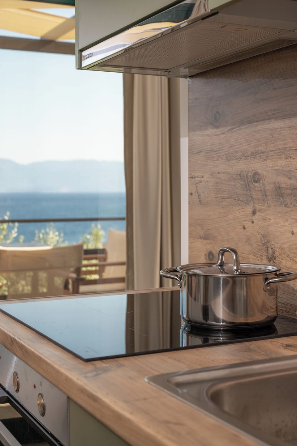 Family Apartment, 2 Bedrooms, Sea View | Private kitchen | Mini-fridge, oven, stovetop, coffee/tea maker