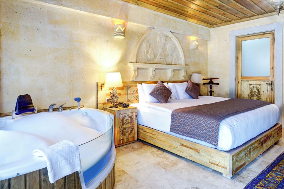Deluxe Suite | Egyptian cotton sheets, premium bedding, Select Comfort beds, minibar