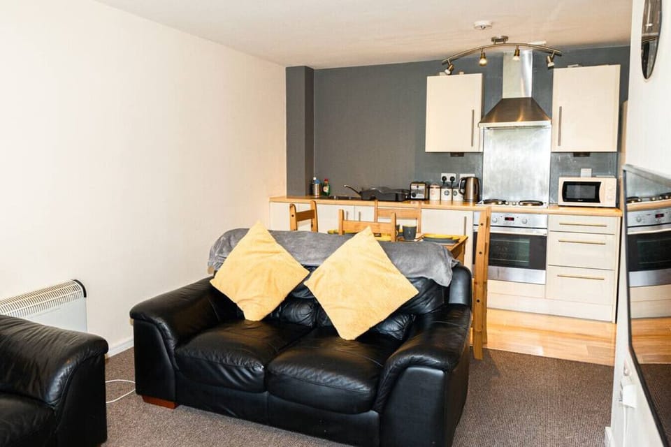 Comfort Apartment | Living area | 32-inch LED TV with digital channels