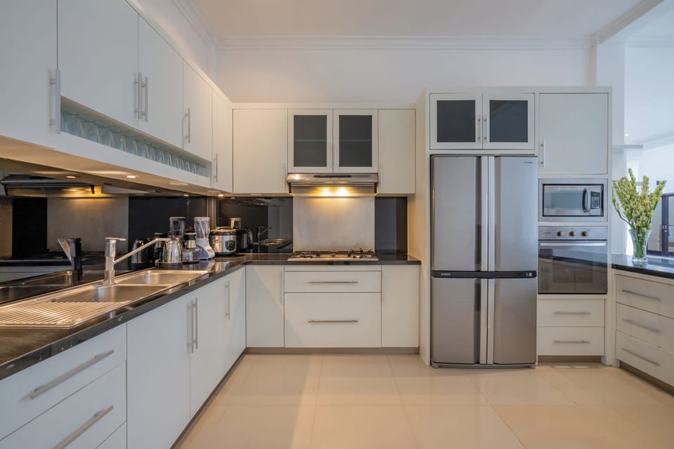 Family Villa | Private kitchen | Shared fridge, microwave, coffee/tea maker, electric kettle