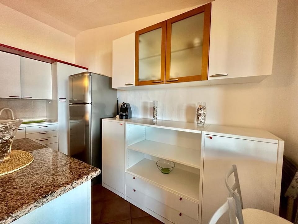 Apartment | Private kitchen | Full-size fridge, oven, stovetop, cookware/dishes/utensils