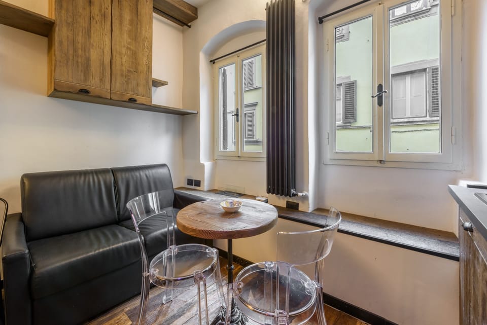 City Apartment | Living area | 40-inch flat-screen TV with digital channels