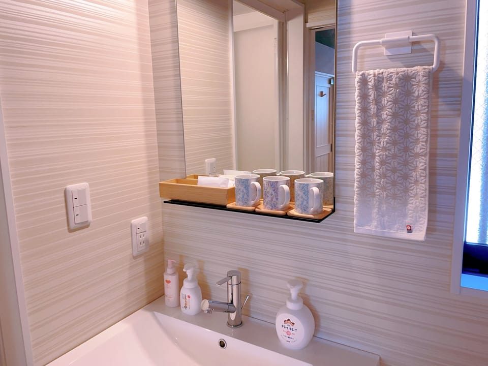 Romantic Triple Room | Bathroom | Combined shower/tub, free toiletries, hair dryer, bathrobes