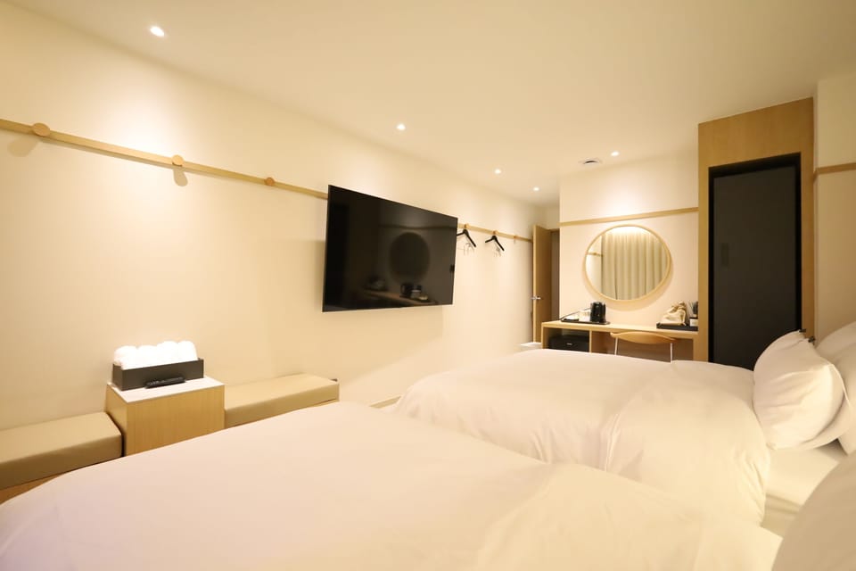 Family Twin Room, City View | Laptop workspace, WiFi (free)