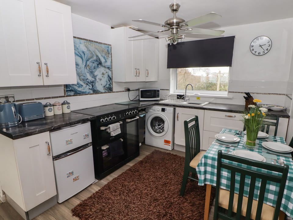 Fridge, electric kettle, toaster, cookware/dishes/utensils