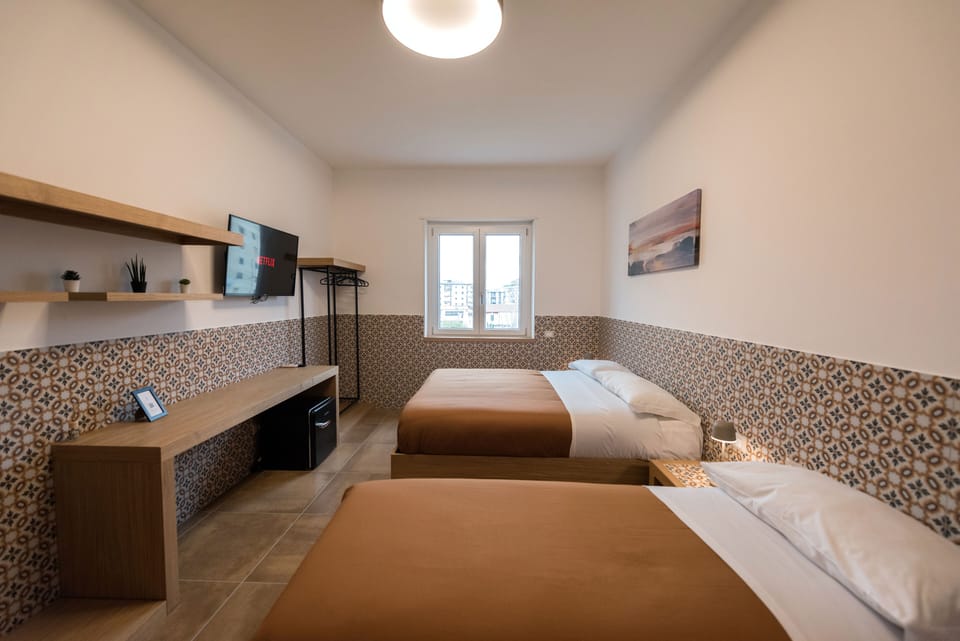 Superior Triple Room, City View | 1 bedroom, premium bedding, down comforters, pillowtop beds