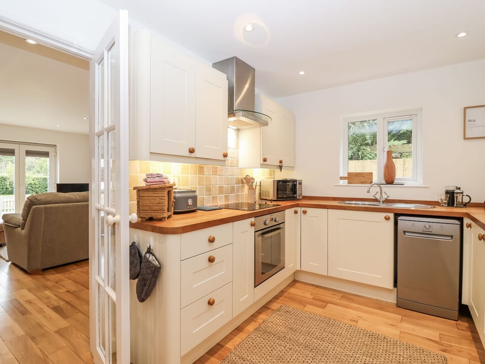 Fridge, electric kettle, toaster, cookware/dishes/utensils