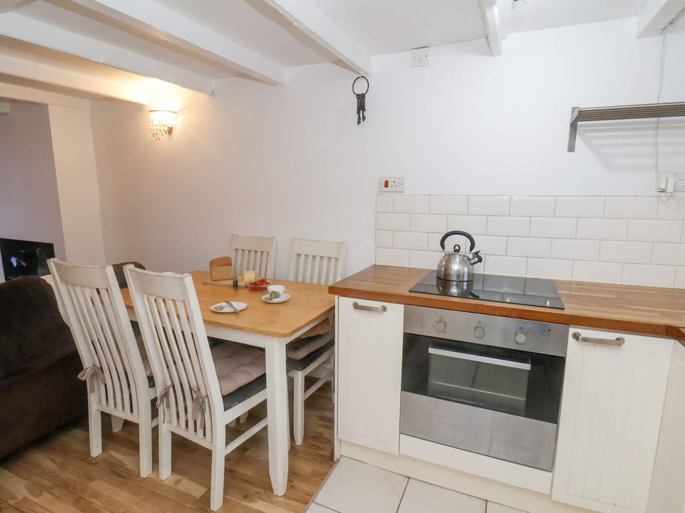 Fridge, electric kettle, toaster, cookware/dishes/utensils
