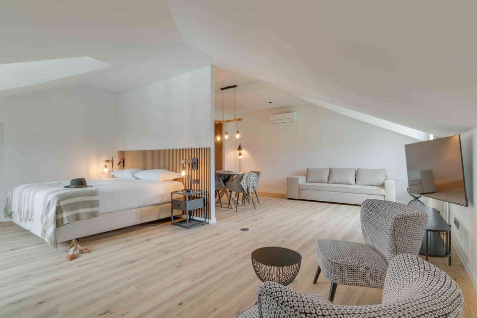 Suite (Club House) | Minibar, in-room safe, desk, blackout drapes