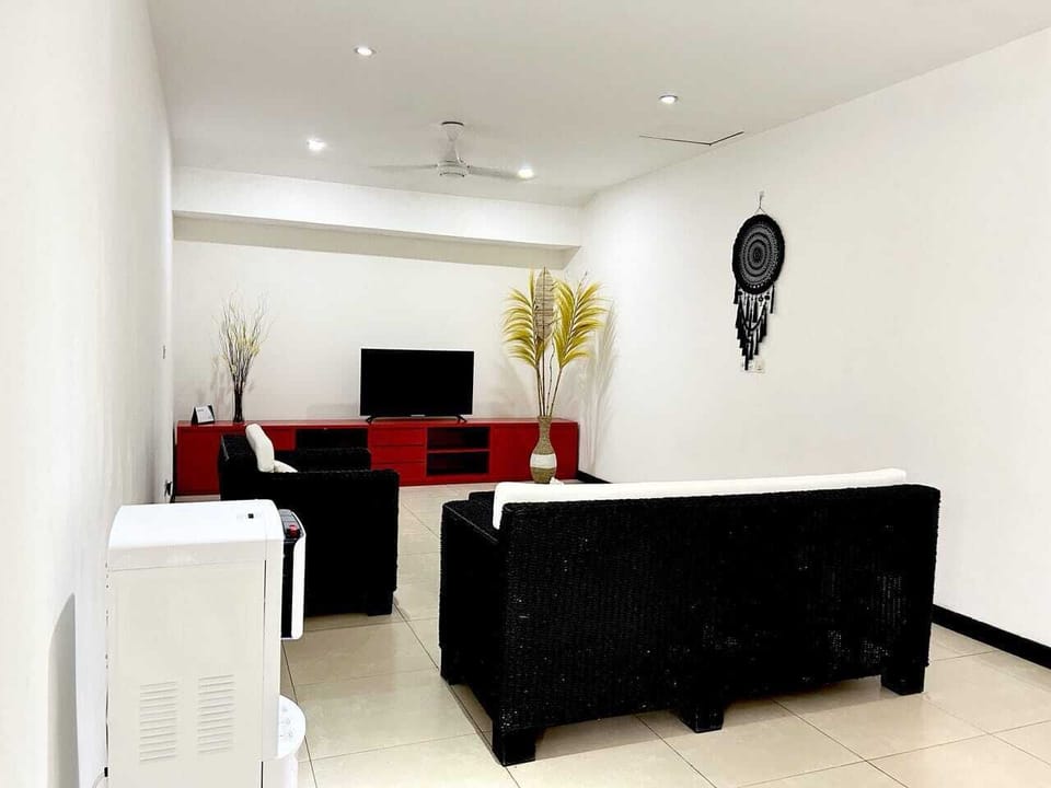 Villa | Living area | Flat-screen TV