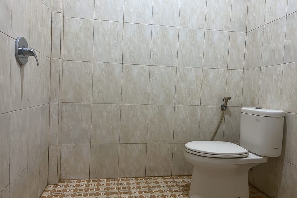 Standard Double Room | Bathroom | Shower, towels, soap