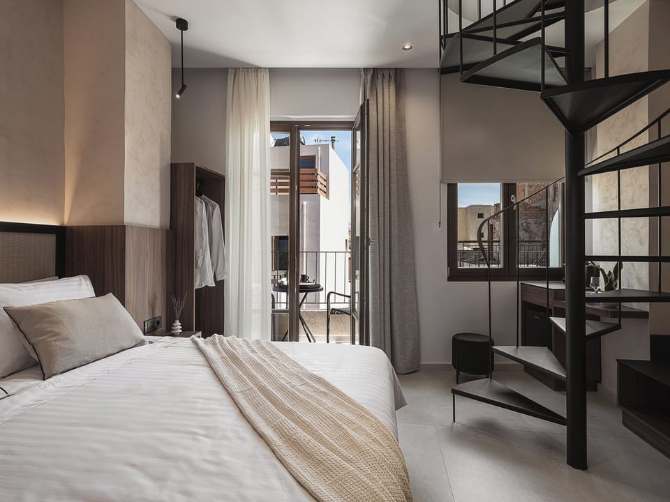 Signature Suite, 1 Queen Bed, Hot Tub, City View | Hypo-allergenic bedding, in-room safe, blackout drapes, soundproofing