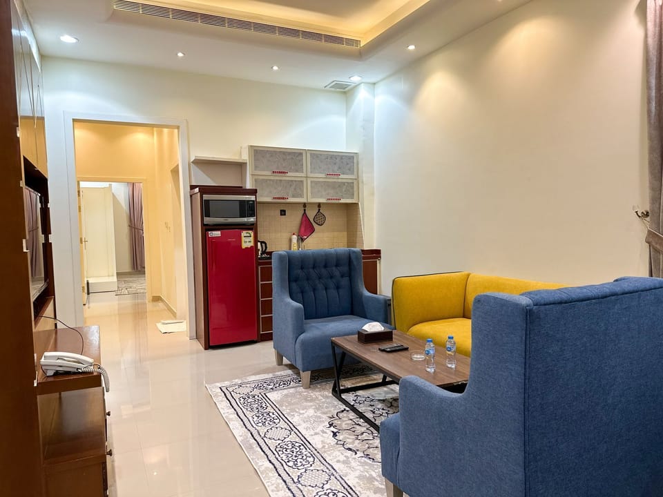 Standard Apartment | Living area | 43-inch flat-screen TV with satellite channels, TV