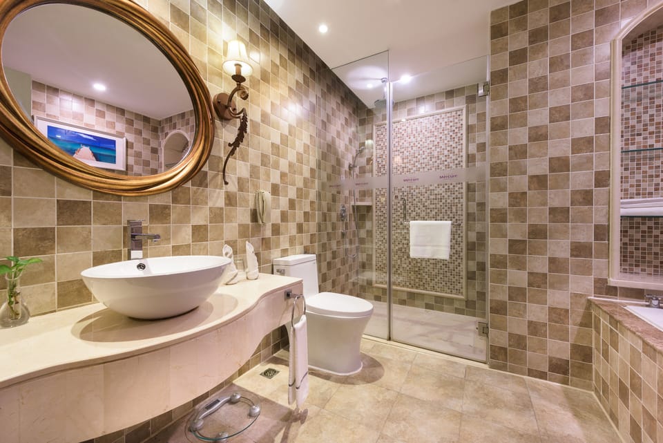 Shower, eco-friendly toiletries, hair dryer, bathrobes