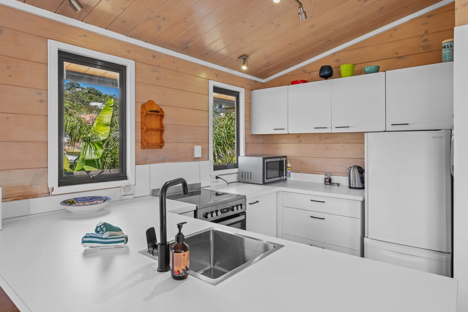 Family House, Balcony, Partial Ocean View | Private kitchen | Full-size fridge, microwave, oven, stovetop