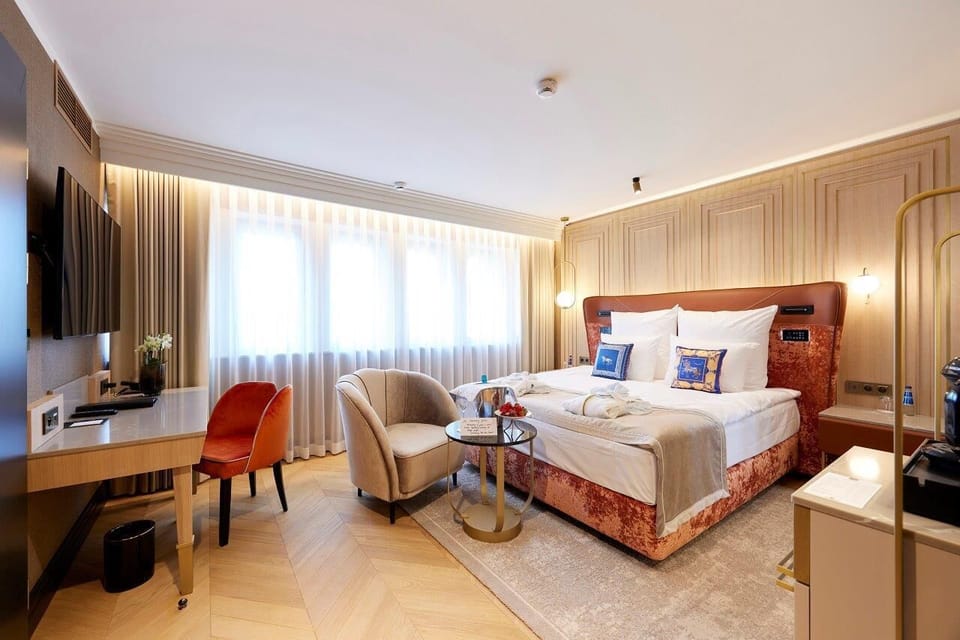 Comfort Double Room | Minibar, in-room safe, iron/ironing board, travel crib