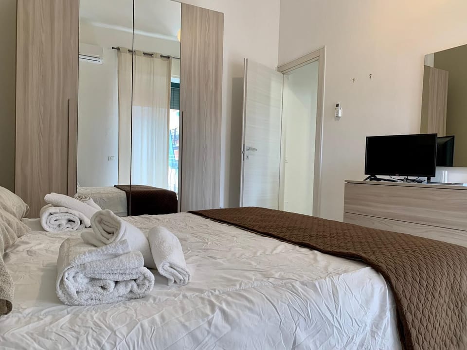 Family Quadruple Room, City View | Soundproofing, free WiFi