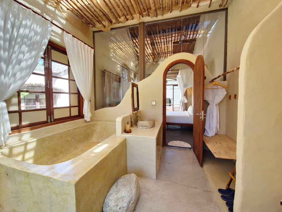Premium Villa, Pool View | Bathroom | Bathtub, designer toiletries, hair dryer, slippers
