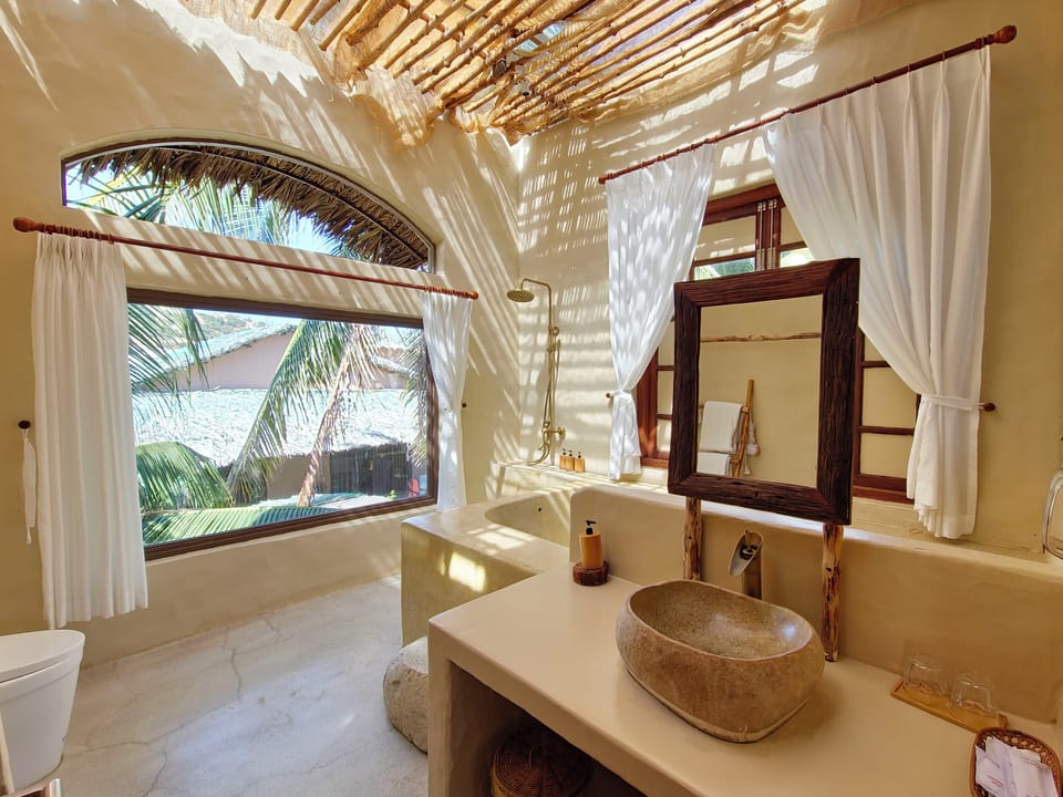 Premium Villa, Pool View | Bathroom | Bathtub, designer toiletries, hair dryer, slippers