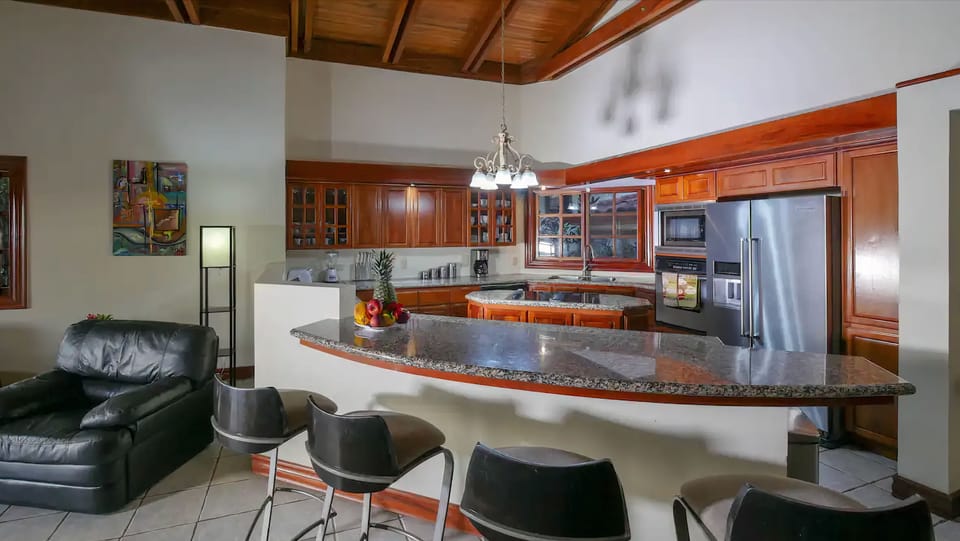 Luxury Villa | Private kitchen | Full-size fridge, microwave, oven, stovetop
