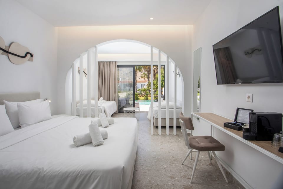 Family Room | Premium bedding, in-room safe, iron/ironing board