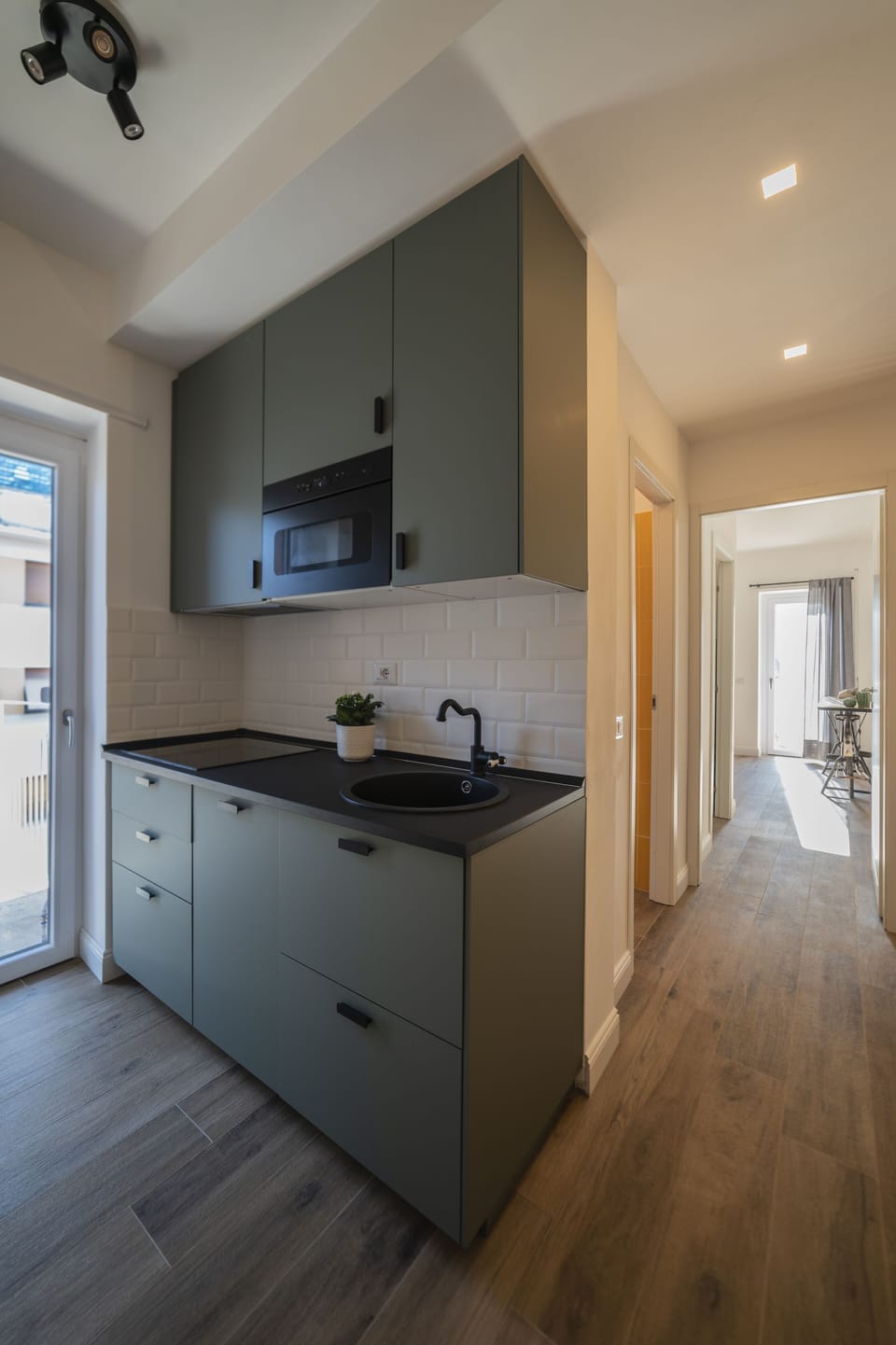 Comfort Condo | Private kitchen | Full-size fridge, microwave, stovetop, dishwasher