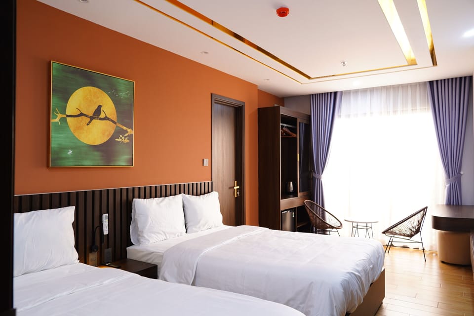 Family Quadruple Room | Minibar (some free items), in-room safe, desk, blackout drapes