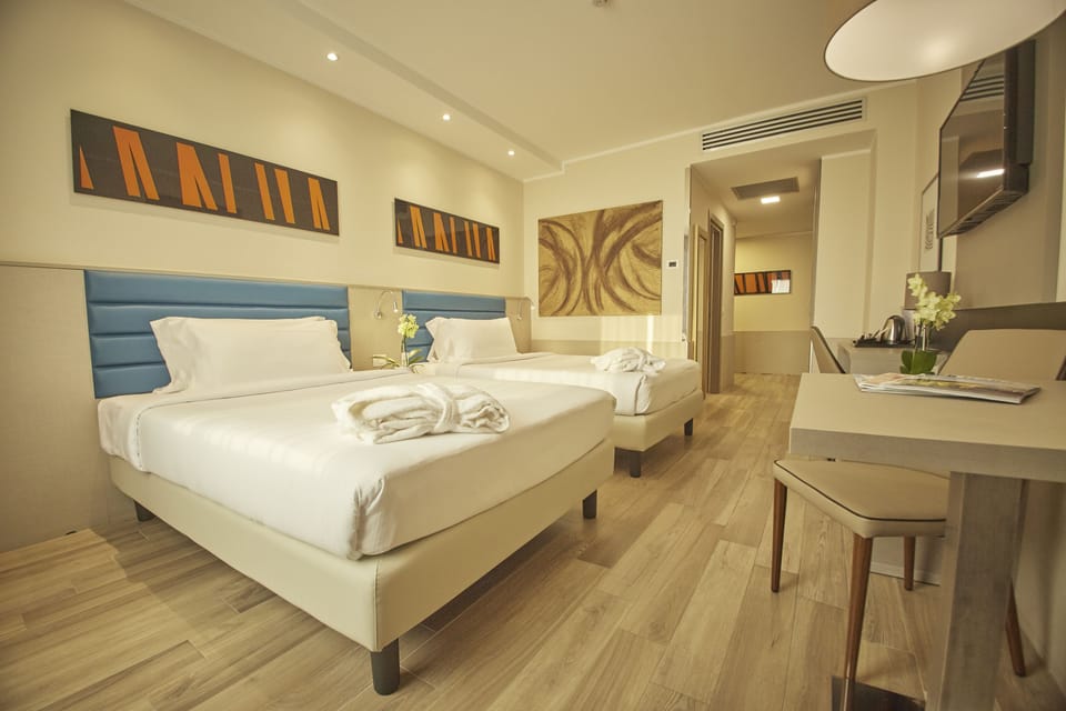 Standard Quadruple Room | Premium bedding, down comforters, minibar, in-room safe