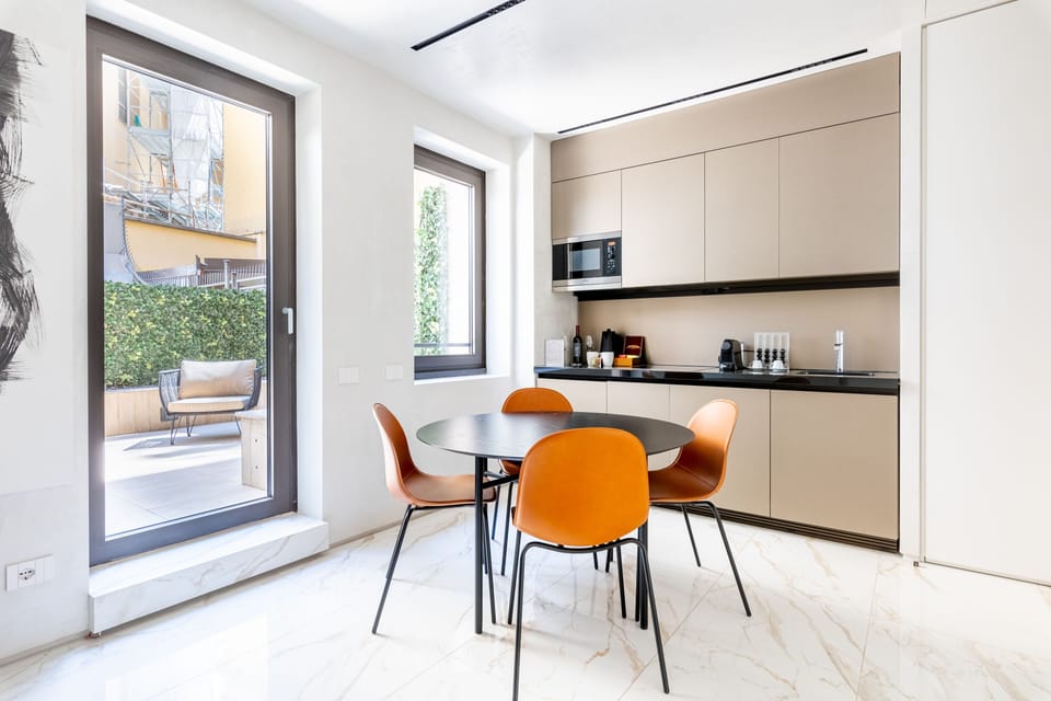 Executive Suite | Private kitchen | Espresso maker, electric kettle, cookware/dishes/utensils