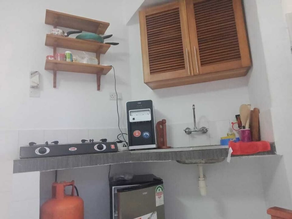 Fridge, microwave, cookware/dishes/utensils