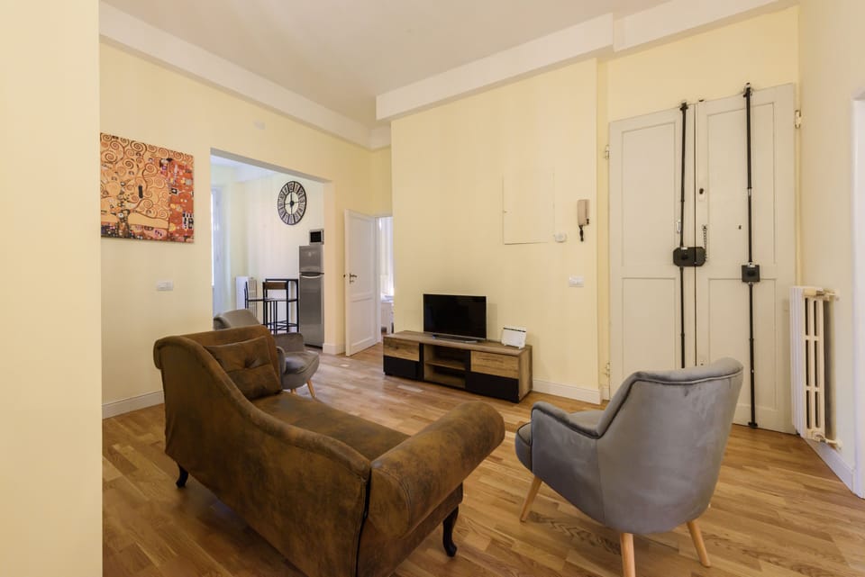 Comfort Apartment | Living area | 40-inch flat-screen TV with digital channels