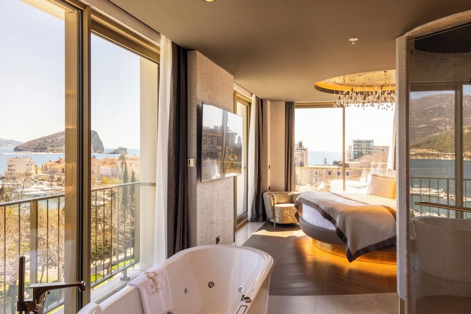 King Suite | Egyptian cotton sheets, premium bedding, down comforters, minibar
