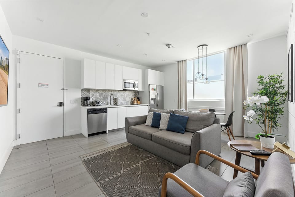 Design Apartment | Living area | 42-inch LCD TV with cable channels