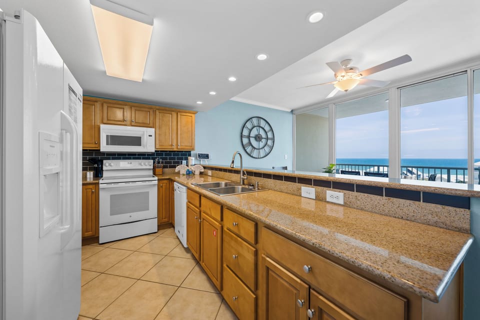 Comfort Condo, 2 Bedrooms, Balcony, Beach View | Private kitchen | Coffee/tea maker, fridge, microwave, oven