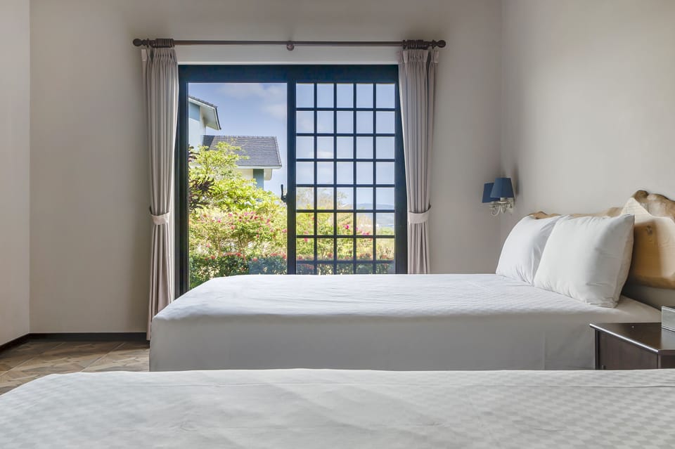 Quadruple Room, Garden View | Blackout drapes, free WiFi, bed sheets