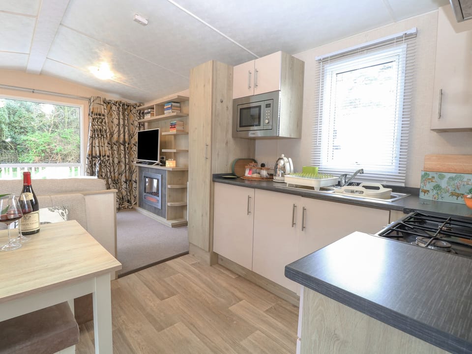 Fridge, electric kettle, toaster, cookware/dishes/utensils