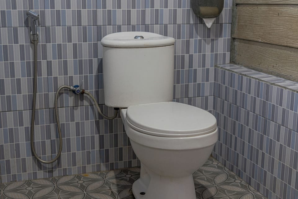 Standard Double Room | Bathroom | Combined shower/tub, rainfall showerhead, bathrobes, towels