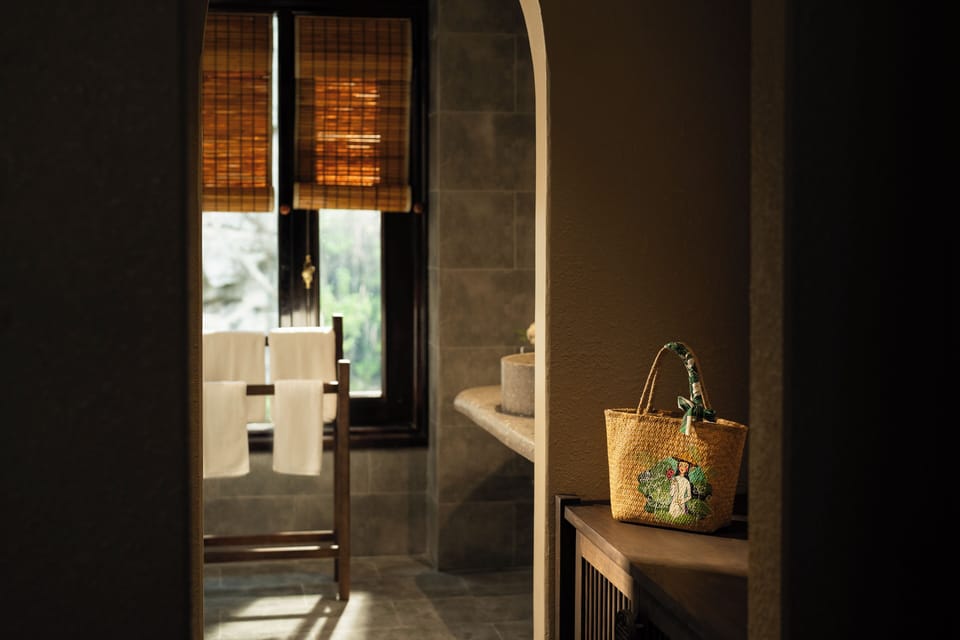 Designer toiletries, hair dryer, bathrobes, slippers