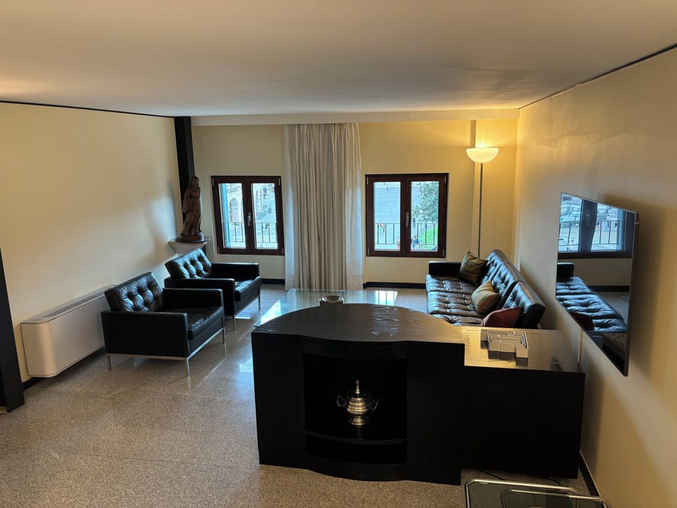Apartment | Living area | 55-inch flat-screen TV with cable channels