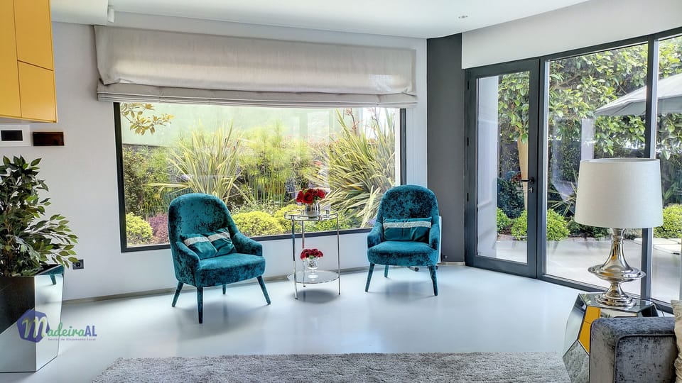 Deluxe House | Living area | Flat-screen TV