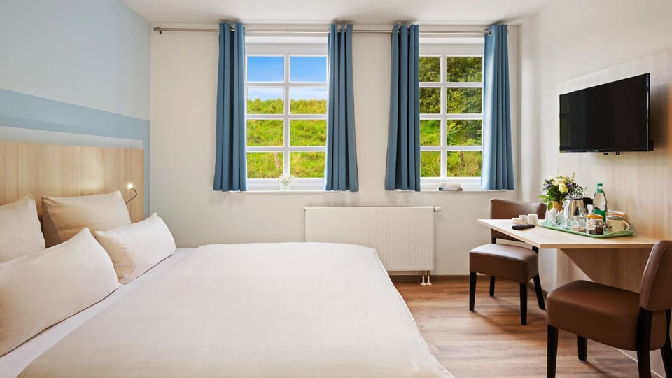 Desk, free WiFi, bed sheets