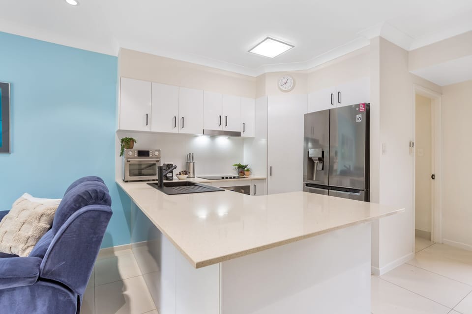 Comfort Apartment | Private kitchen | Full-size fridge, microwave, oven, stovetop