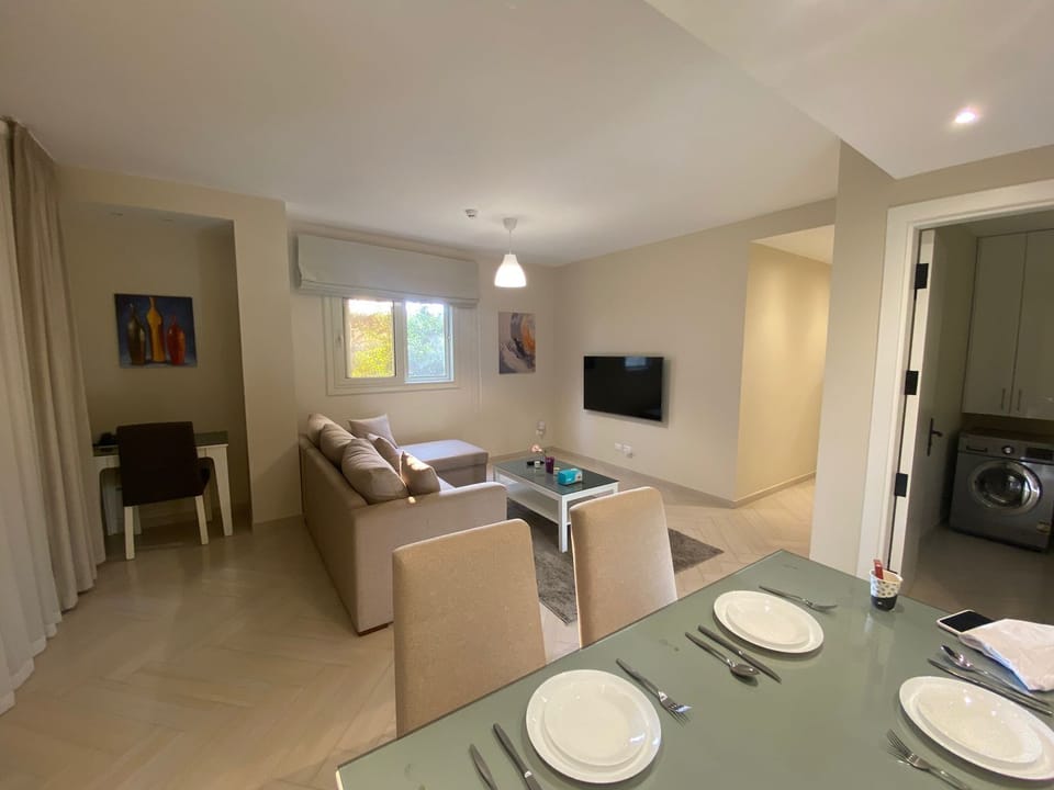 Suite | Living area | 50-inch Smart TV with satellite channels