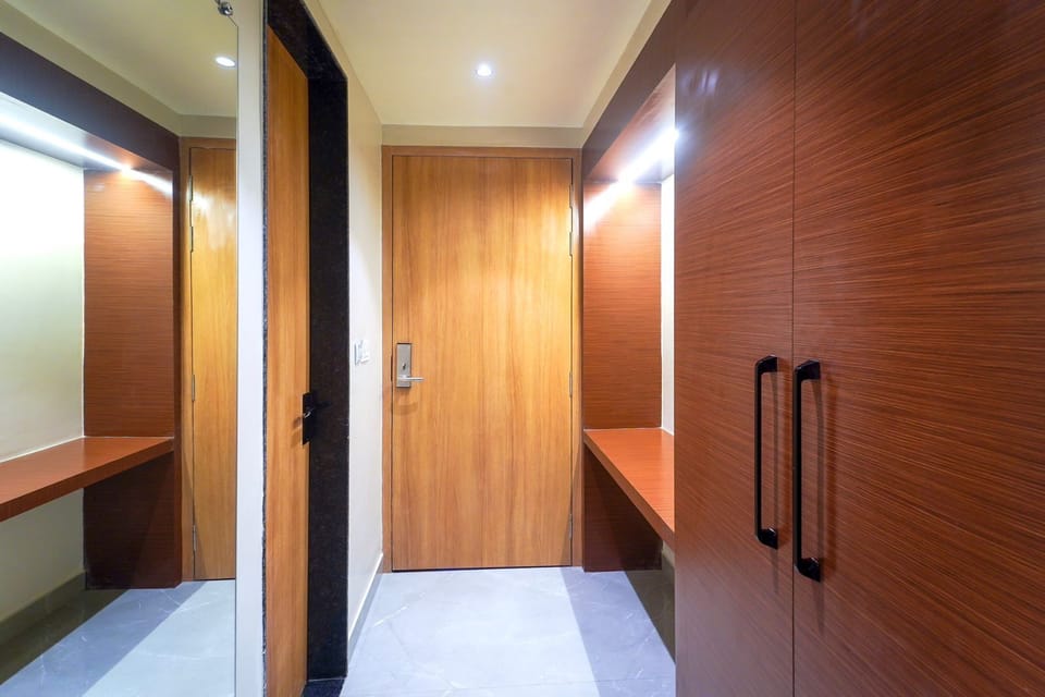 Deluxe Double Room | Living area | Flat-screen TV